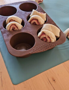 Erdbeerschnecken-Muffins aus Quarkölteig